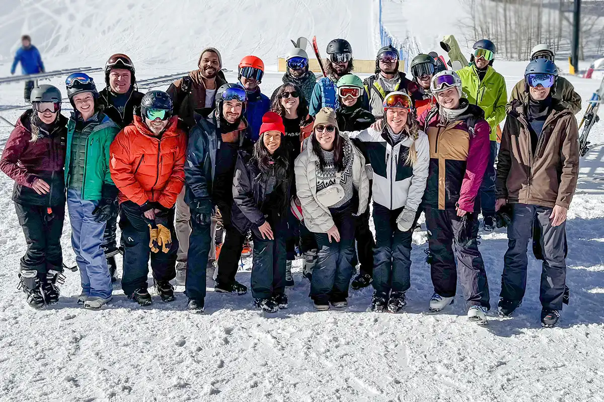 A group photo of Name.com Employees at Winter Park for Name.com Ski Day 2025