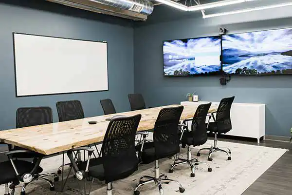 An empty conference room in the Name.com office