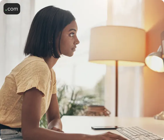 Woman looking at computer screen.